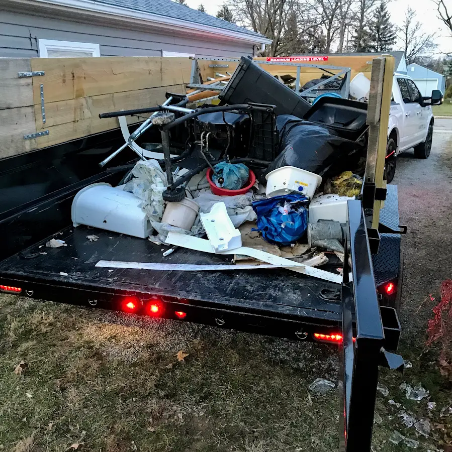 Roll-off dumpster delivered to a residential driveway in Milton