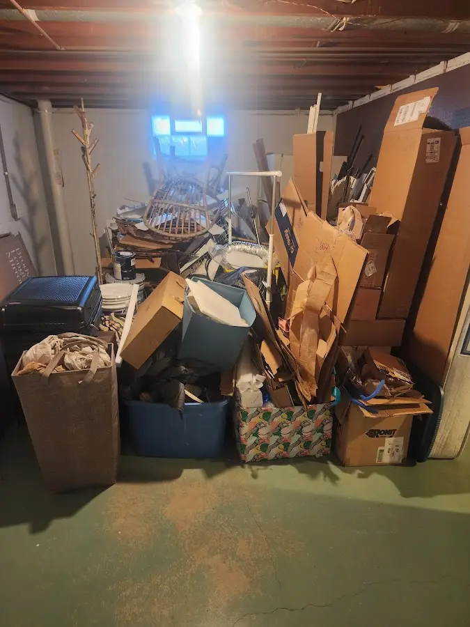 Roll-off dumpster container at job site for Yard Waste Dumpster Rental in Milton